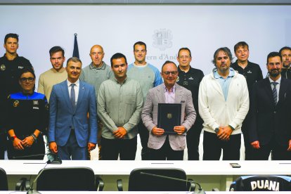 El cap de Govern, Xavier Espot, el ministre de Funció Pública, Marc Rossell, i els representants sindicals.