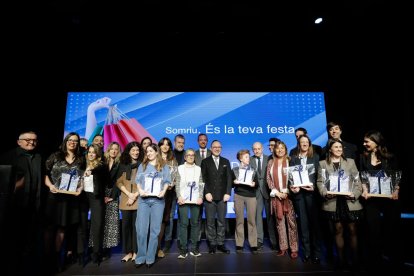 Els premiats amb les autoritats a la Festa del Comerç celebrada ahir