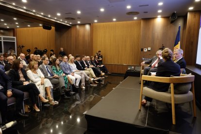 Els assistents a la jornada durant la primera conerència