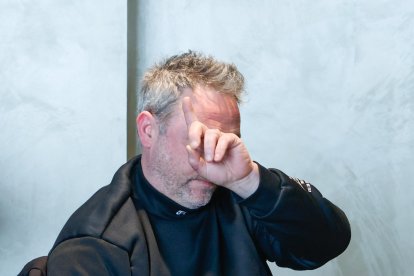 El taxista a la signatura.