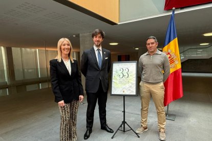 Carles Ensenyat i Sandra Codina, al costat de Xavier Casals.