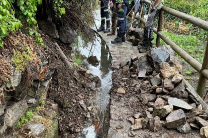 Caiguda d'un mur al rec del Solà per les pluges