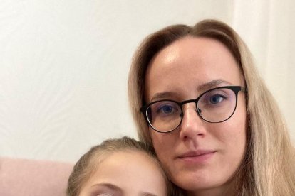 Kuzmenko i la seva filla de nou anys.