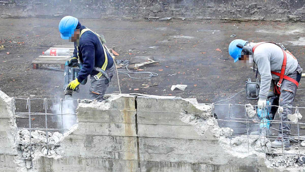 Dos treballadors de la construcció.