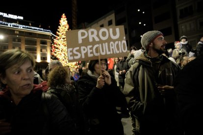 Manifestant amb un cartell 