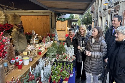 Els cònsols d'Ordino, Maria del Mar Coma i Eduard Betriu, durant la inaguració de la Fira de Nadal d'Ordino.