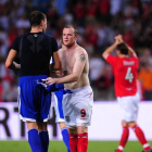 Rooney i Lima intercanviant la samarreta.