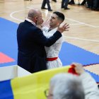 Silvio Moreira celebrant la medalla d’or amb el seu entrenador.