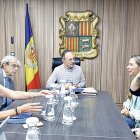 Membres d’Horitzons reunits amb Espot, Baró i Cadena.