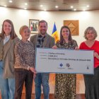 Lliurament del xec a Càritas d’Encam