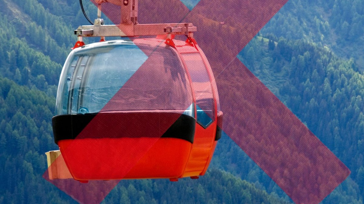 La imatge d'un telecabina amb una creu que fa servir APAPMA per oposar-se al telefèric de Canillo.