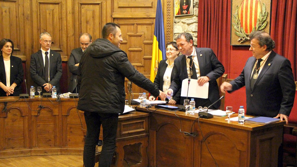 Els desEners i manadors de la parròquia juren el càrrec