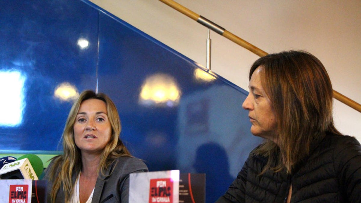 Campanya per fomentar l'ús del català entre els comerciants del Pas