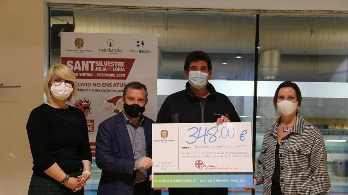 El Comú de Sant Julià de Lòria lliure a Caritas la recaptació de la Cursa Sant Silvestre