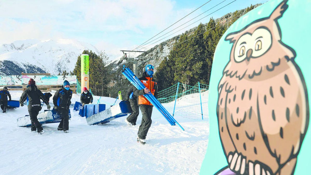 Treballadors en un camp de neu.