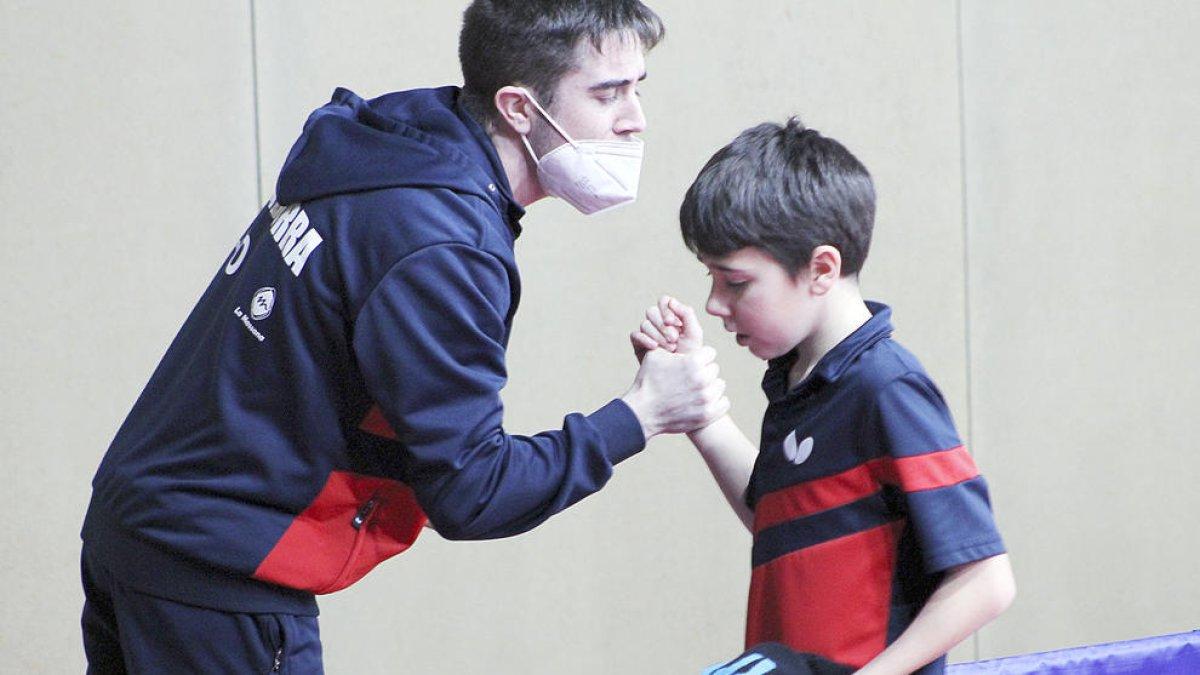 Oriol Martínez amb l'entrenador.