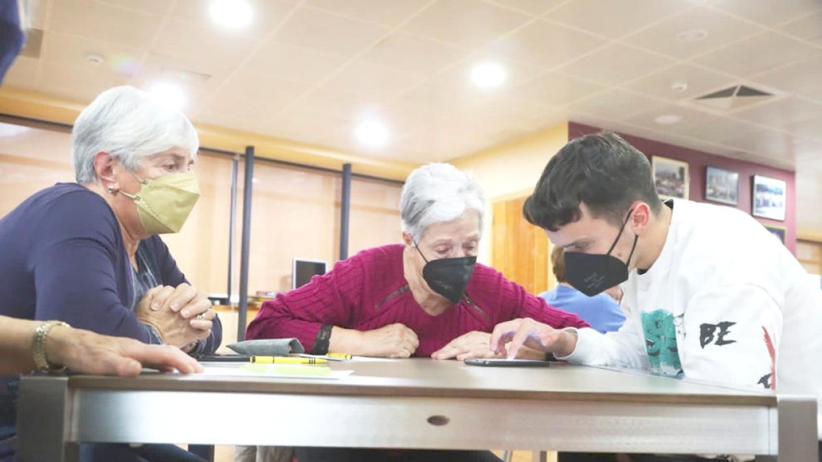 Taller d'ús dels mòbils.