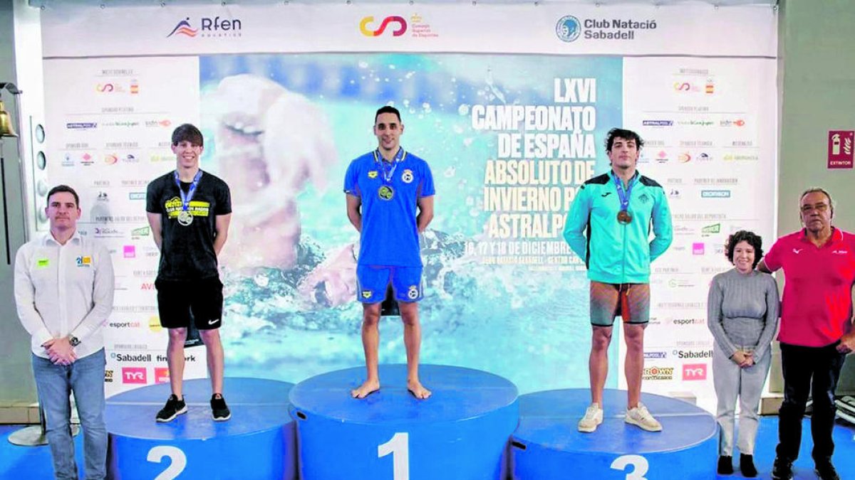 Pelegrina, a la dreta, en un dels dos podis.