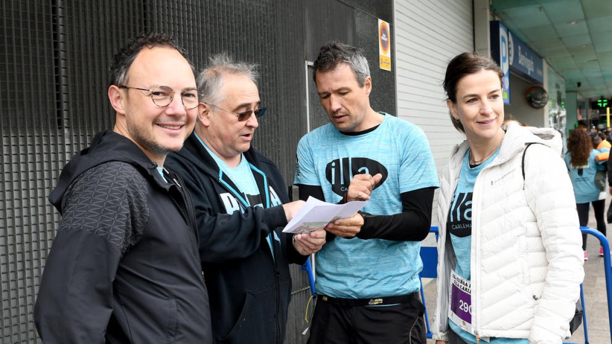 Xavier Espot, David Astrié i Sílvia Riva a la cursa popular Illa Carlemany.
