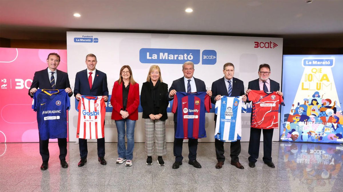 Vilaseca, a l'esquerra, a la presentació.