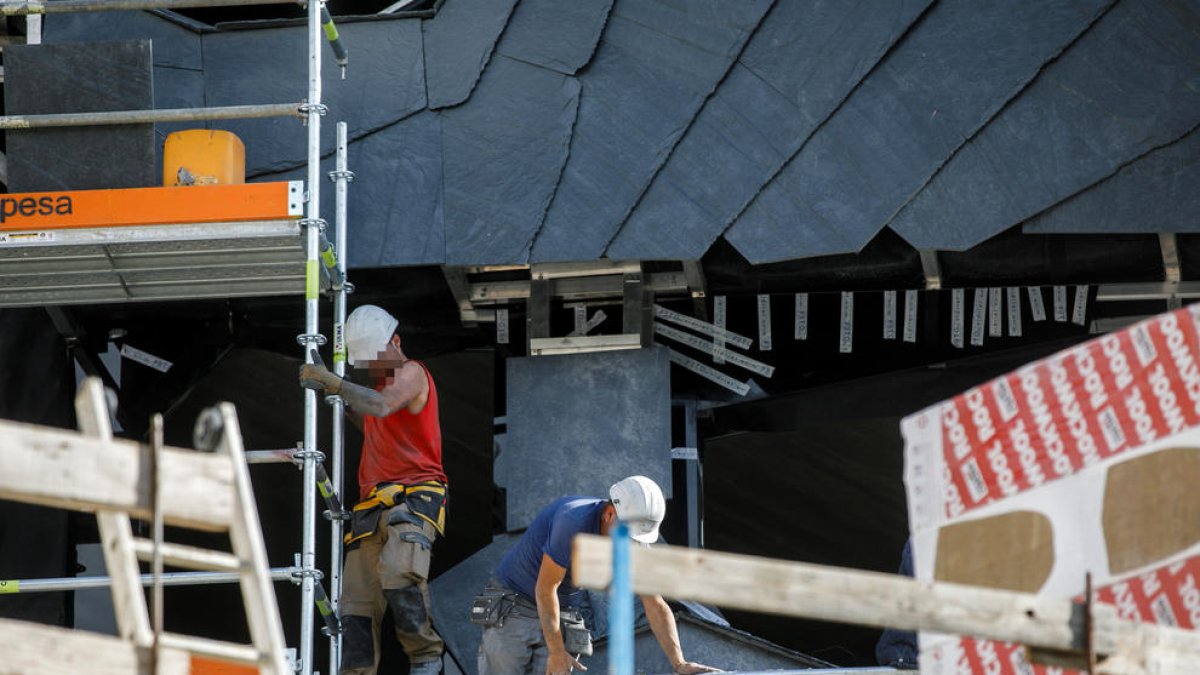 Obrers a la constucció.
