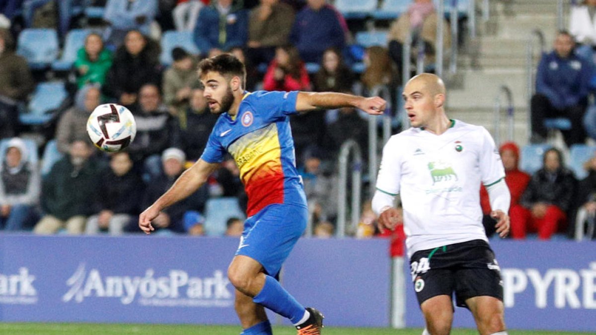 Pombo, a la dreta, el curs passat al Nacional.
