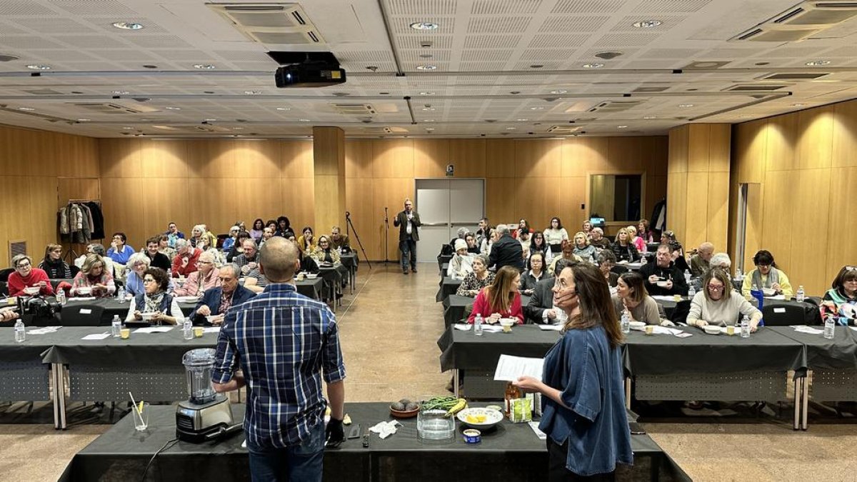 Dénoyers, Rodríguez i els participants al taller d'Assandca