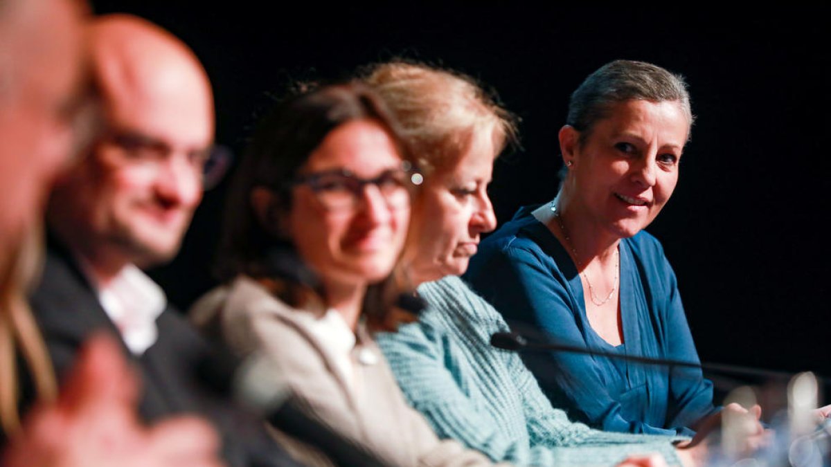 Els especialistes en oncologia i la pacient.