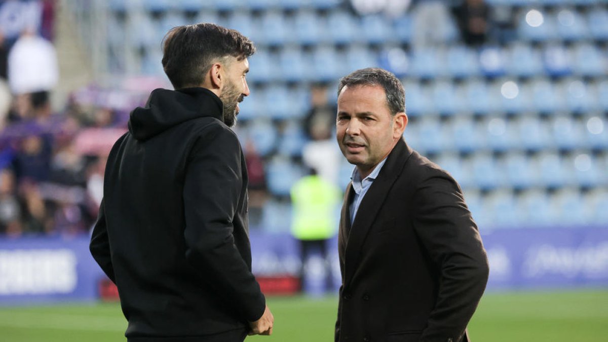 Javi Calleja amb Sarabia a l'Estadi Nacional.