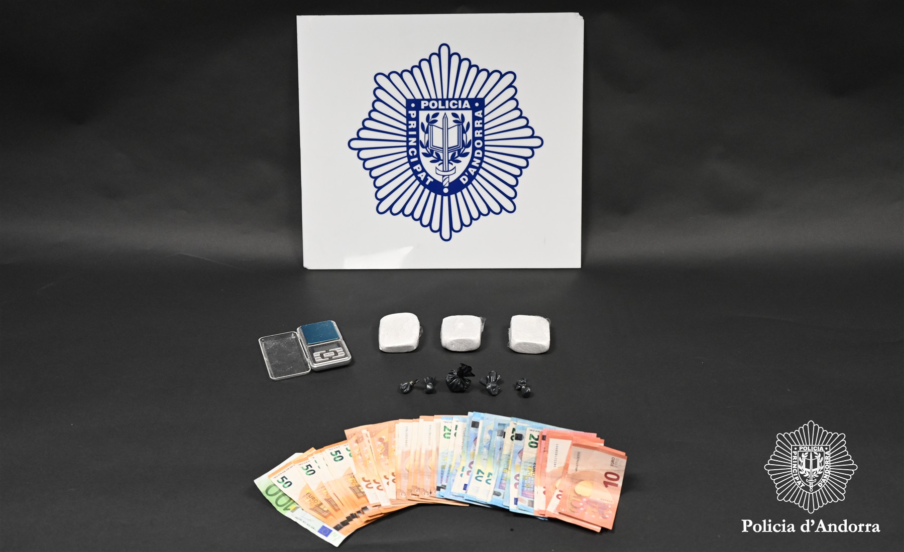 Material, cash and narcotics confiscated.