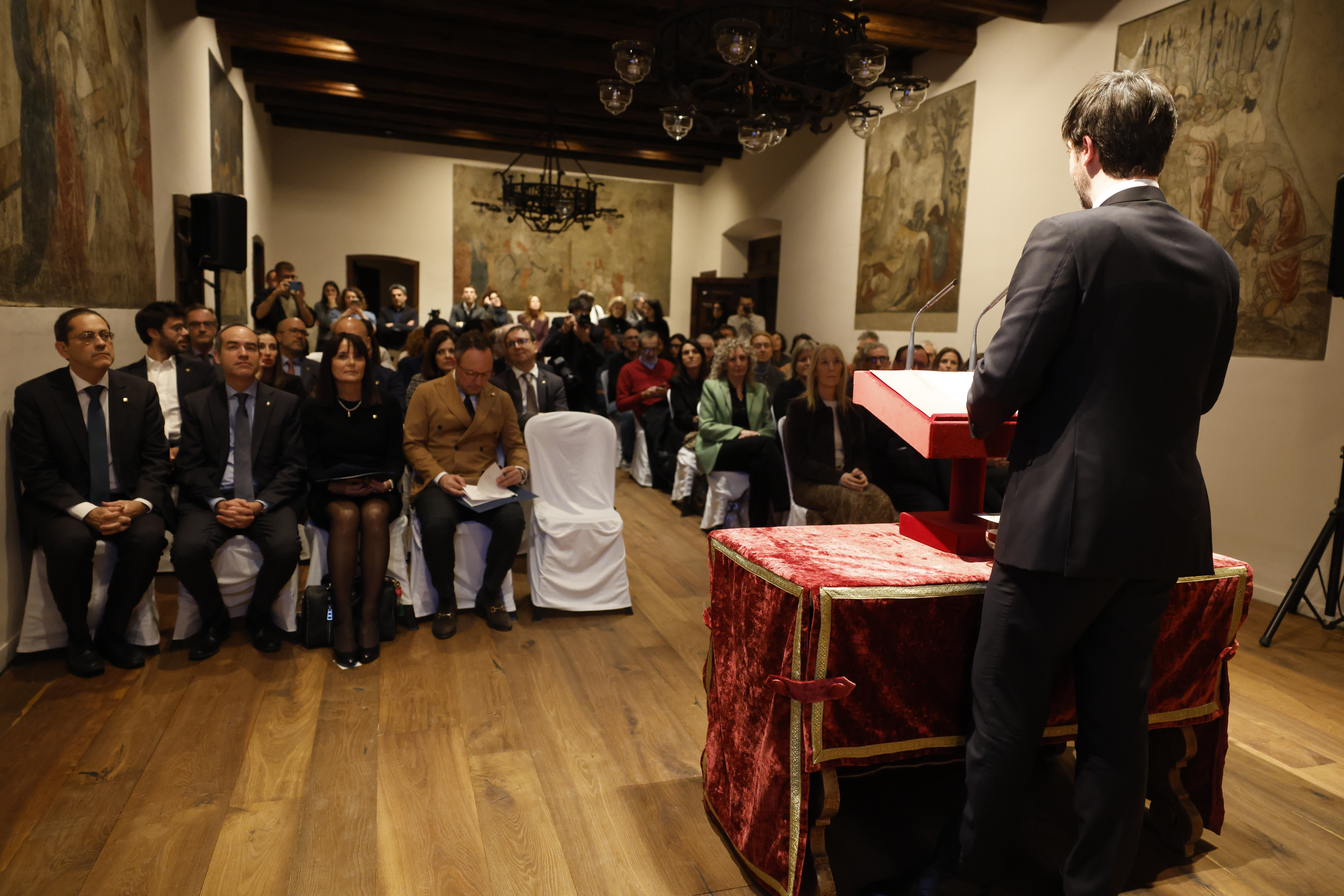 Political authorities listening to the speech of the syndic general, Carles Ensenyat, during the presentation of the candidacy to UNESCO.