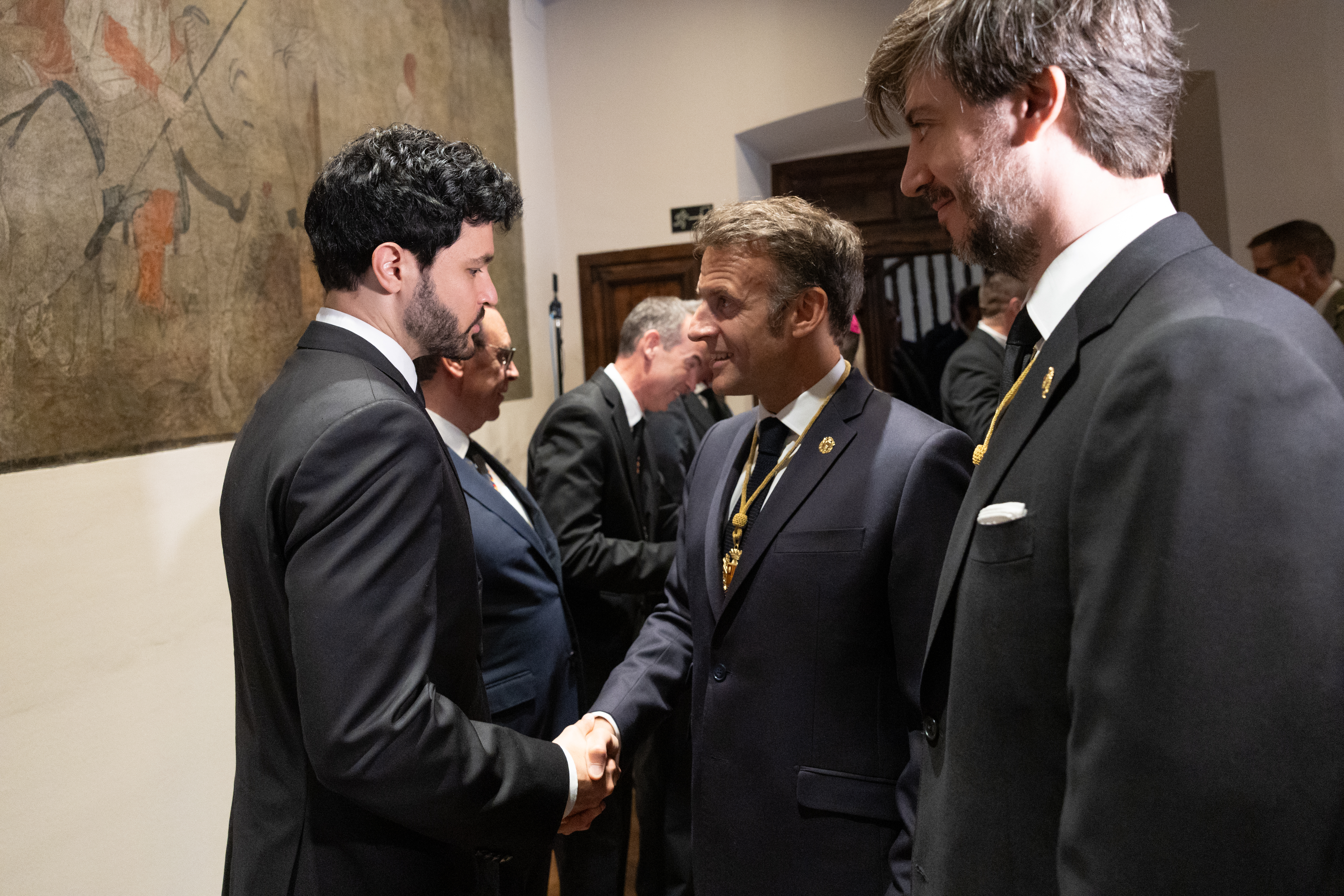 Macron greeting Cerni Escalé at Casa de la Vall.