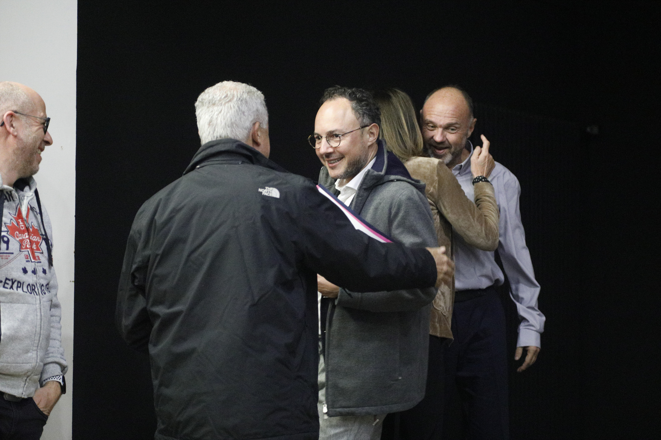 Ubach, in the background, and Xavier Espot at the exit of an event.