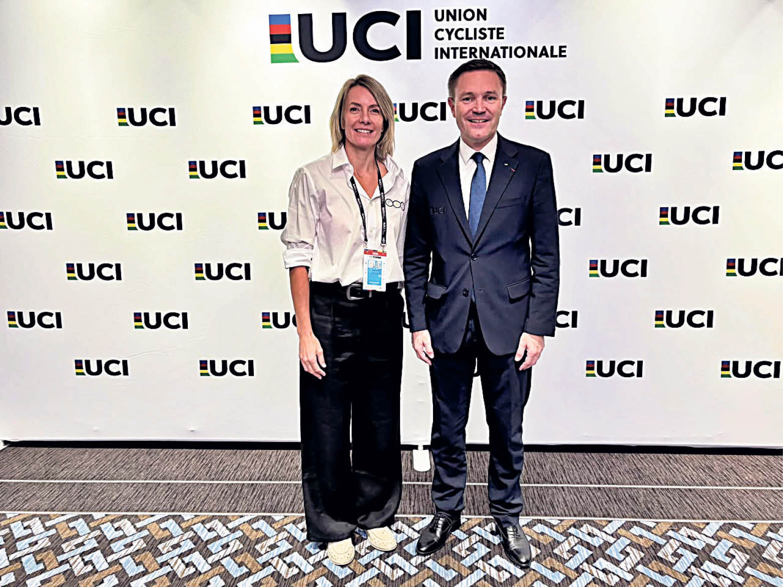 Carolina Poussier with the president of the UCI, David Lappartient.